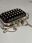 Vintage clutch bag with studs
