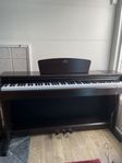 el piano Yamaha Arius YDP140  