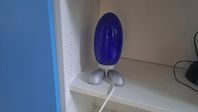 Blå lampa på fötter