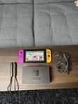 Nintendo Switch V2 + 64 Spel