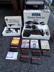 Sega Master System CIB med spel och Light Phaser