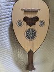 Oud med ryggsäcksfodral