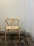 Stol med vävd sits
