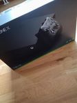Xbox One X 1TB + controller and 2 games.