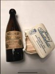 Tomflaska och etiketter från ”Bollnäs nya bryggeri”