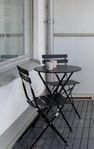 utebord med tillhörande stolar 