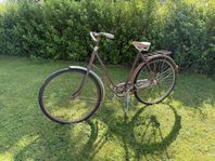 Gammal retro damcykel