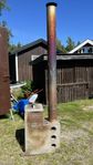 Vedkamin till badtunna