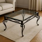 Soffbord i smide och glas – elegant design