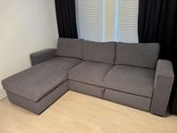 Grå bäddsoffa