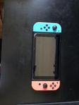 Nintendo switch med tillbehör och väska