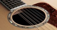12-strängad akustisk gitarr KÖPES