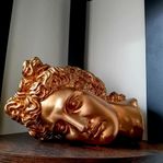 Apollo huvud staty