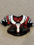 Axelskydd ccm junior storlek M