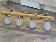 Lampa kombinerat med ljushållare