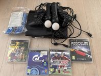PS3 med 4 spel, 2 kontroller och 2 movekontroller.