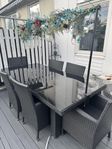 Snyggt utomhus matbord med 6 stolar–konstrotting & glasski