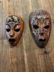 Samling afrikanska maskar och staty