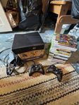 Xbox 360 med 19 spel och 2 kontroller