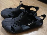 Nike tofflor