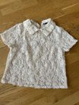 en vacker blus vit/beige i str L