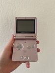 Game Boy Advance + 16 spel (inkl. Pokémon Emerald Version)