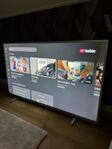 Philips 50" 4K UHD Smart TV med Vogels väggfäste