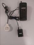 Telefon med tillbehör