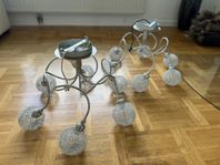 Två stilrena taklampor i metall – modern design