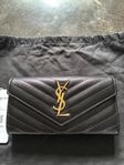 Yves Saint Laurent - Cassandre Leather clutch bag