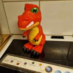Leksaksdinosaurie som snorar