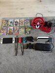 Nintendo Switch OLED + 11 spel + tillbehör – komplett pak
