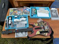 Wii konsol med spel och gitarr 