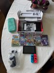 Nintendo Switch med 5 Spel och Tillbehör