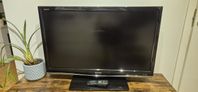 Sharp Aquos full HD TV med fjärrkontroll.