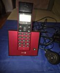 Telefon vägg o en bordstelefon