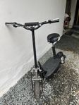Elscooter med sadel