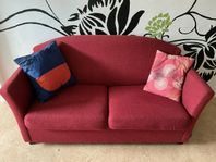 Röd bäddsoffa