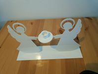 ljusstake med änglar