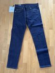 Oanvända Lindeberg Jay Indigo jeans!