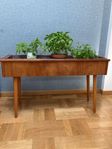 Blomlåda i teak