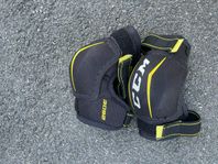 Armbågsskydd hockey