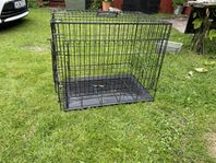 Stor hundbur i svart metall