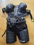 Axelskydd och byxor Hockey CCM