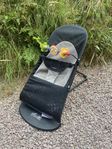 Babybjörnsitter med lekbåge