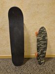 Min dotter säljer sina skateboards.  Skateboard
