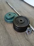 Skivstång med 32,5 kg viktskivor 