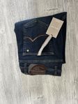 Jacob Cohens jeans med etikett