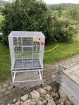 1 stor fågelbur med tillbehör samt mindre transport bur 