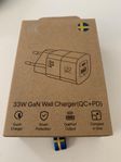 Multi adapter och sladd i oöppnad förpackning
